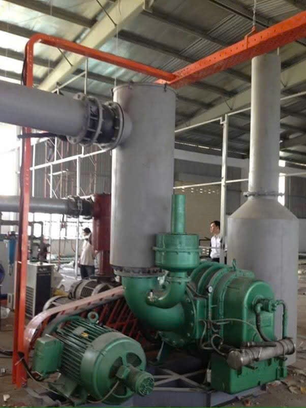 Historical industrial central vacuum system using a blower for low-vacuum high-flow suction