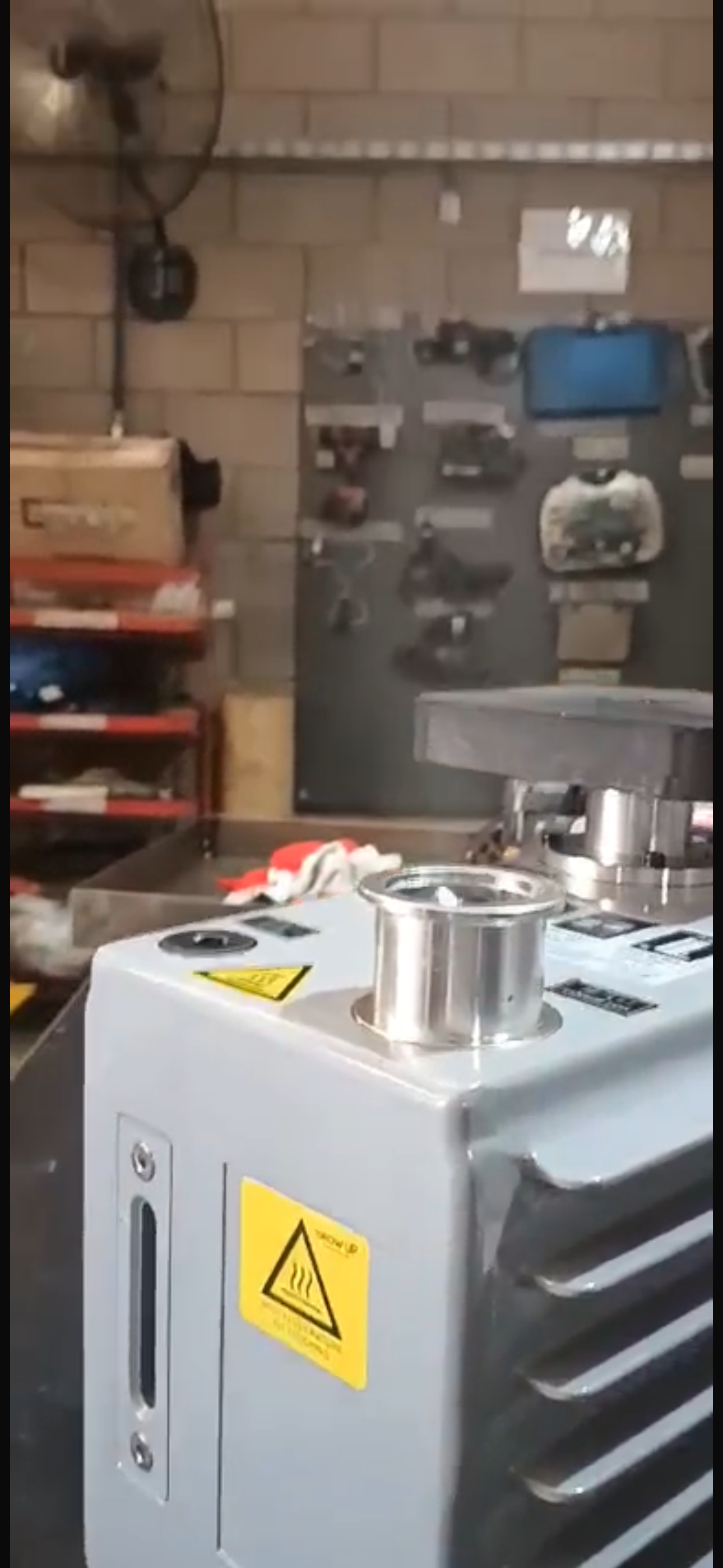 Two-stage rotary vane vacuum pump during a field vacuum performance test