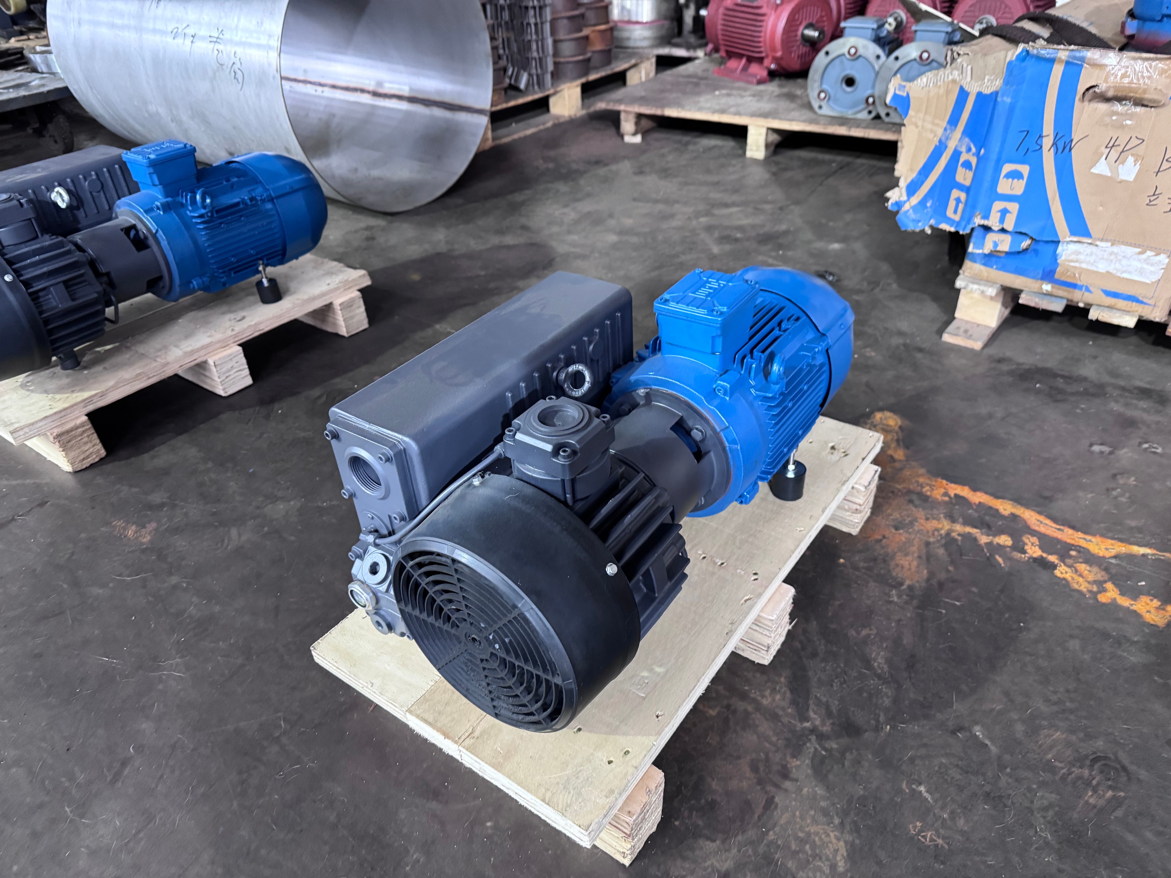 XMV Series oil-sealed rotary vane vacuum pump — blue unit front angle view